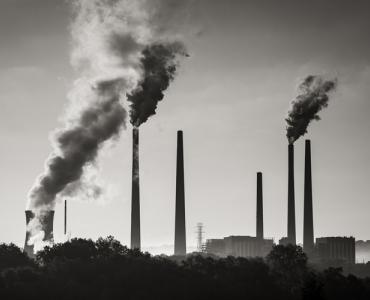 Industrial chimneys belching pollution into the air