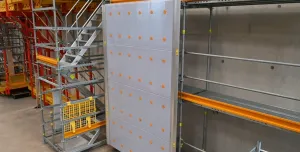A grey scaffolding cladding panel