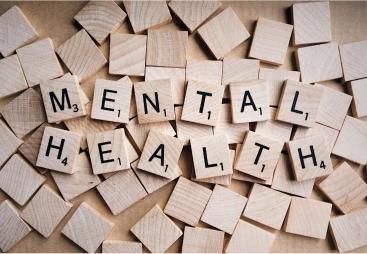 Wooden scrabble letter spelling Mental Health