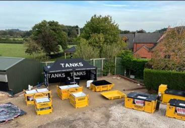 A yard with water treatment equipment