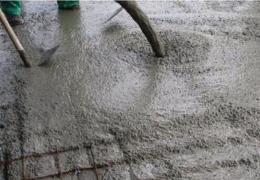 A concrete floor being poured