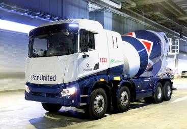 Singapore’s first electric-powered concrete truckmixer painted in Pan-United’s signature red and blue