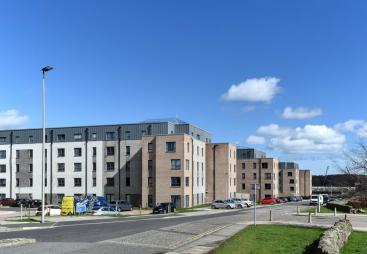 Four low rise blocks of flats