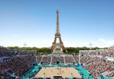 The Eiffel Tower with a Paris 2024 Olympic tennis court in the foreground