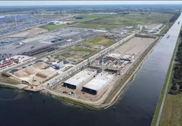 An aerial view of a large industrial dock with construction work taking place