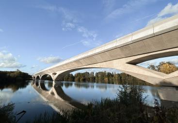 The Colne valley viaduct, a concrete bridge, stretches out over the Colne Valley