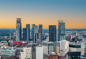 Manchester city skyline at sunset