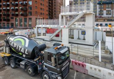 A Capital Concrete mixer delivers concrete to Sisk's Wembley project 