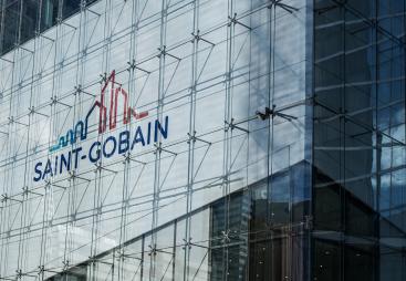 A close up of the Saint Gobain headquarters facade with logo.