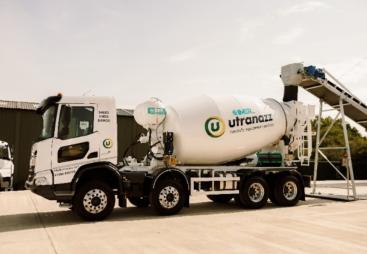 IMER's Superlight 9m³ Concrete Mixer at it's UK launch at Utranazz's Open Day on 13 and 14 June 2025, in white with a the Utranazz's logo on its side