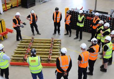 Members of the Gel Engineering team receive training on RUNDLEX Circular Wall Formwork at the PERI training facility and exhibition hall in Brentwood
