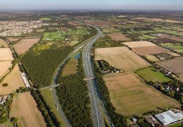 An aerial view of the Lower Thames Crossing junction with the M25 (looking north), with a new bridge for Ockendon Road. Image: National Highways.