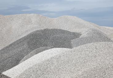 A close up photo of a pile of aggregates with light and shade