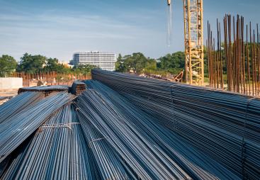 Rebar and a yellow tower crane