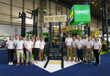 Combilift staff celebrate The 100,000th Combilift forklift, a golden Combi-CBE, was unveiled at IMHX 2025 in Birmingham.