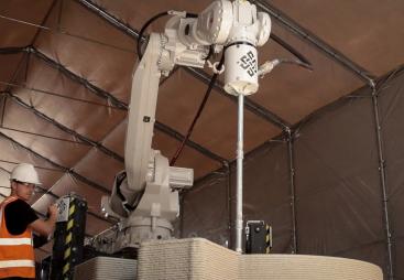 ChangeMaker3D’s robotic printing hub at Wigan Wastewater Treatment Works, where 3D-printed concrete components are produced for United Utilities and Scottish Water. (Image: ChangeMaker3D)