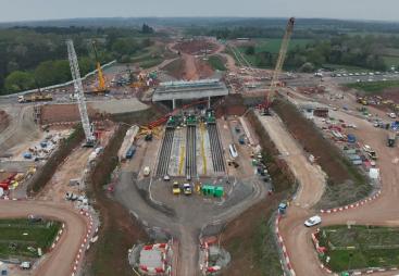 An aerial view of The 14,500-tonne concrete box structure for HS2’s A46 Kenilworth bypass bridge was built offline and slid into place in just 18 days. (Image courtesy HS2 Ltd)