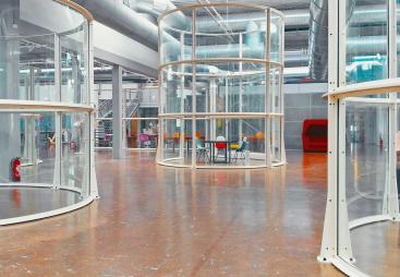 The glass canopy surrounding the outside escalators at the Centre Pompidou in Paris has been reused to create office space. (Image: Alexandre Attias)