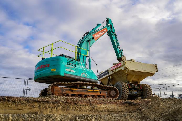 A medium size excavator at work