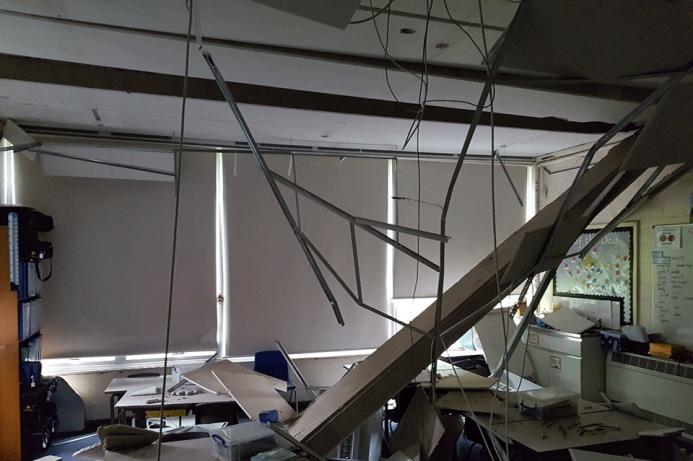 A school classromm with a collapsed roof
