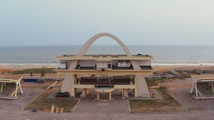 An aerial photo of a modernist concrete building in Africa