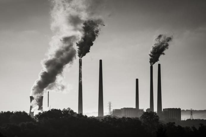 Industrial chimneys belching pollution into the air