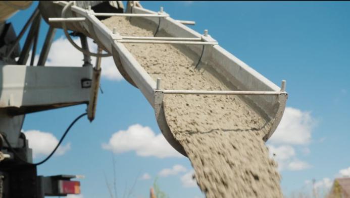 Concrete being unloaded from a concrete mixer