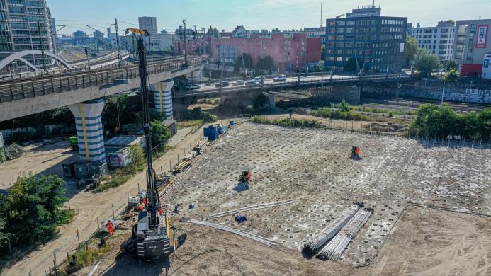 A piling rig on a construction site in an urban setting