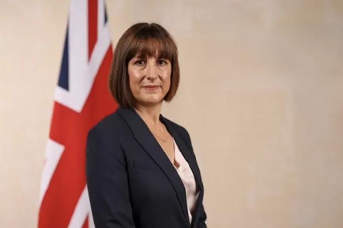 Chancellor Rachel Reeves in front of the Union Jack.
