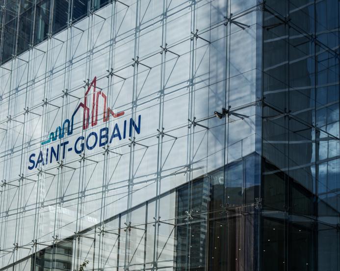 A close up of the Saint Gobain headquarters facade with logo.