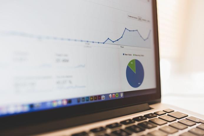 Analytics graphs on a MacBook screen by Luis Llerena / Creative Commons