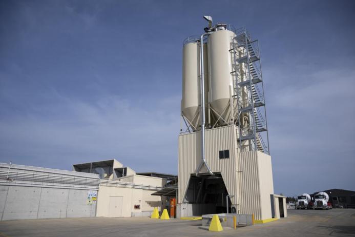 The Wallan site includes four cementitious silos, 10 ground bins for raw materials, a modern office with driver amenities, and undercover truck parking. 