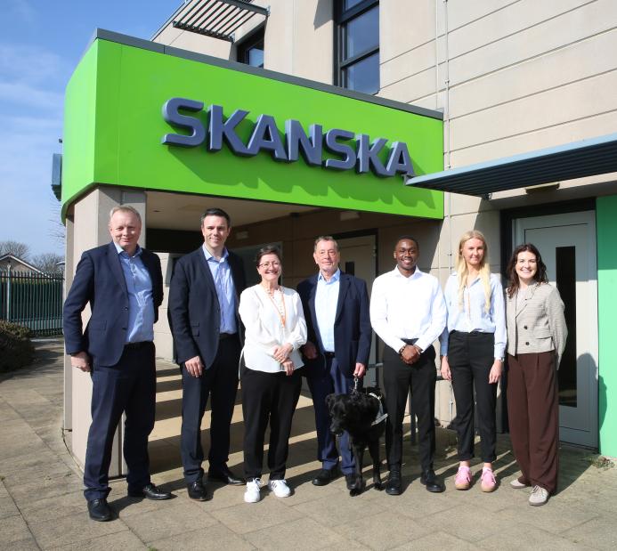 (L-R) Gracie Bocking, trainee civil engineer; Ronald Kiweewa, trainee civil engineer; Lord Blunkett; Katy Dowding, president and CEO Skanska UK; Andy Entwistle, managing director Cementation Skanska.