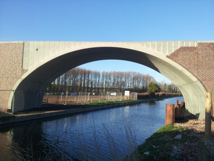 The masonry-clad arch bridge over the historic Chesterfield Canal, one of two critical structures forming the new access road to the Worksop Sludge Treatment Facility (STF) in Nottinghamshire. Image: ABM Precast Solutions.
