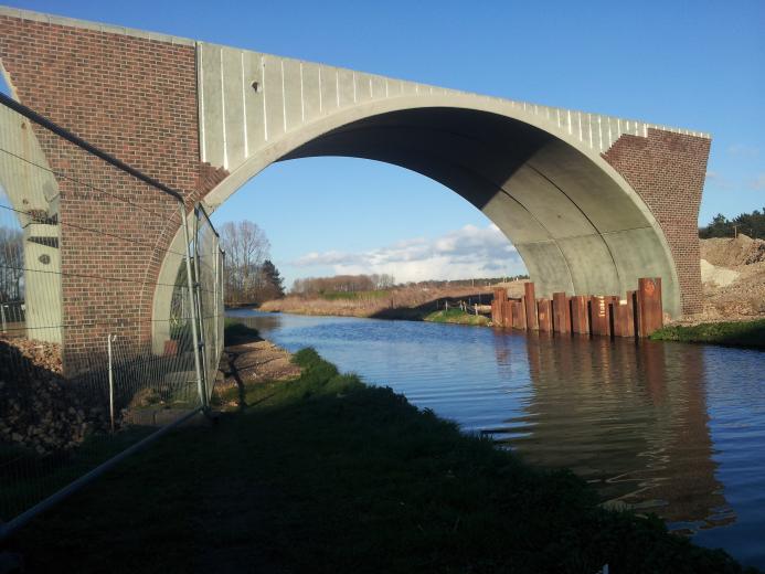 A masonry-clad arch bridge over the historic Chesterfield Canal, one of two critical structures forming the new access road to the Worksop Sludge Treatment Facility (STF) in Nottinghamshire. Image: ABM Precast Solutions.