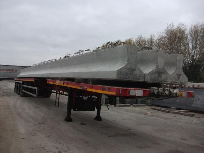 Concrete Y beams on a lorry.