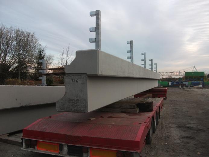 YE2 concrete beams on the back of a lorry.