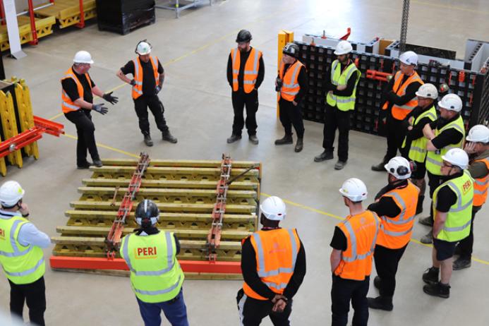 Members of the Gel Engineering team receive training on RUNDLEX Circular Wall Formwork at the PERI training facility and exhibition hall in Brentwood