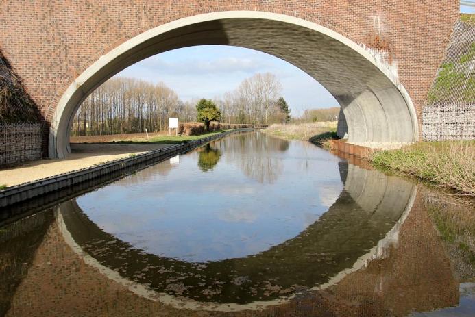 The masonry-clad arch bridge over the historic Chesterfield Canal, one of two critical structures forming the new access road to the Worksop Sludge Treatment Facility (STF) in Nottinghamshire. Image: ABM Precast Solutions.