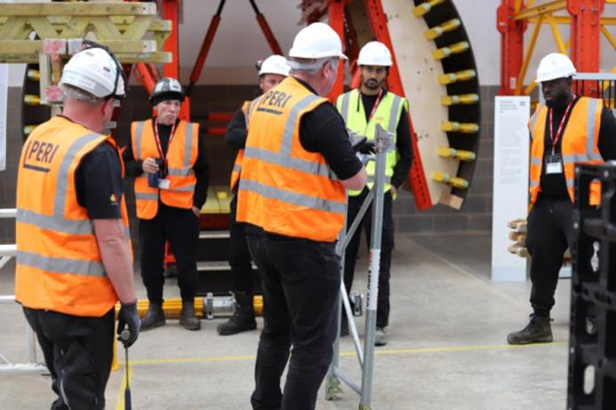 PERI trainers demonstrate to members of the Gel Engineering team how to install MULTIPROP Aluminium Slab Props safely and efficiently