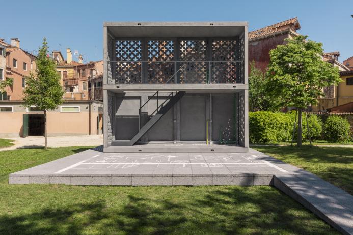 Prototype Basic Services Unit on display at the 2025 Venice Biennale, showing biochar concrete’s architectural potential. Image: Holcim.