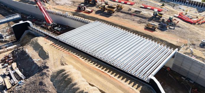 Manufactured in Ireland by Shay Murtagh Precast in Ireland the beams include 45 standard units measuring 21.5 metres long and weighing 17 tonnes each, and two edge beams weighing 35 tonnes apiece.