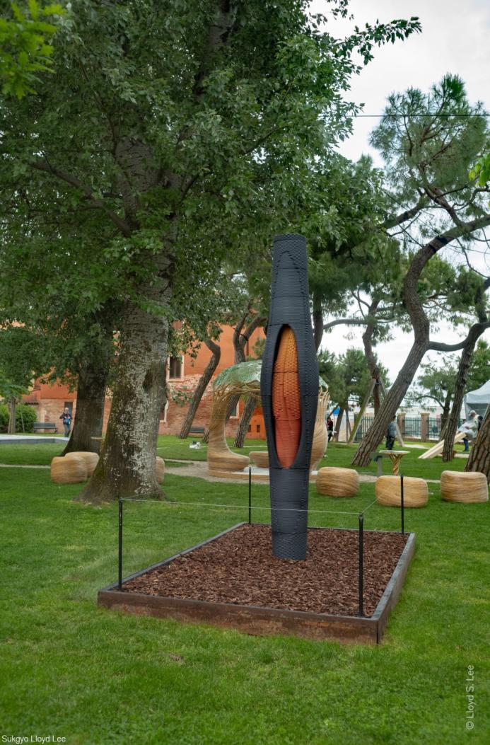A 3D-printed concrete sculpture in a park at the Venice Architecture Biennale