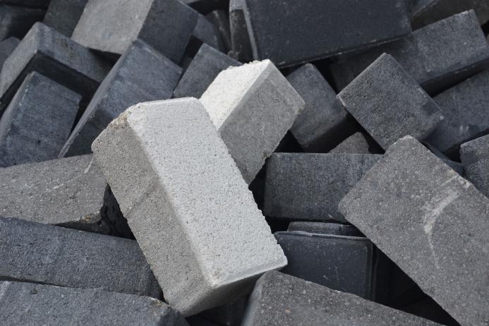 a pile of differently coloured concrete blocks.