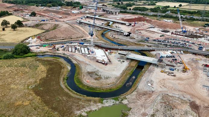 Aerial view of the re-aligned River Cole near Coleshill, showing the new meandering channel created to enable construction of HS2 viaducts at Delta Junction.