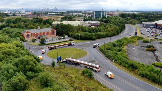 Beams on route from Trafford Park to Greek Street in Stockport August 2025. Specialist vehicles transport the new bridge beams from Trafford Park to Stockport, escorted through tight junctions and roundabouts.