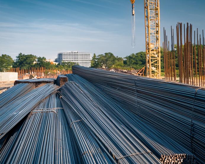 Rebar and a yellow tower crane