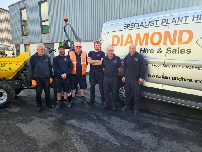 The Diamond Hire and Sales team celebrating 20 years of supplying specialist construction equipment.