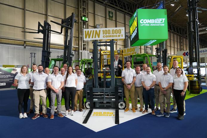 Combilift staff celebrate The 100,000th Combilift forklift, a golden Combi-CBE, was unveiled at IMHX 2025 in Birmingham.
