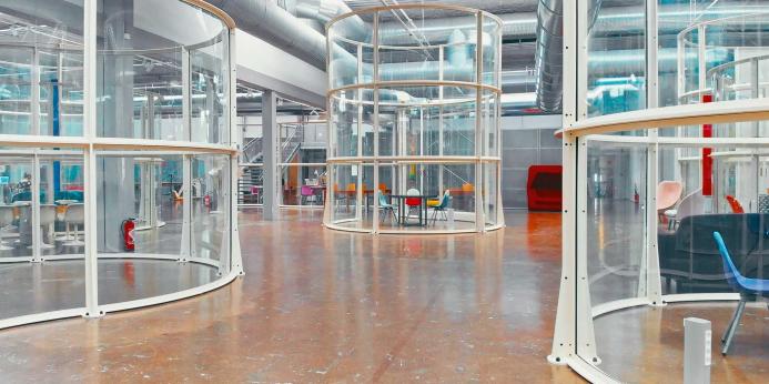 The glass canopy surrounding the outside escalators at the Centre Pompidou in Paris has been reused to create office space. (Image: Alexandre Attias)